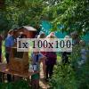 people enjoying a guided tour around the allotment